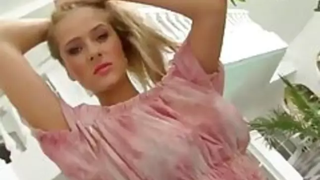 Sensuous light-haired sweety was posing for the camera when she determined to be a bit crazy